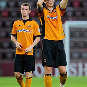 Wolverhampton Wanderers' Greg Halford and Kevin Foley Salute Fans in Heart of Midlothian Friendly