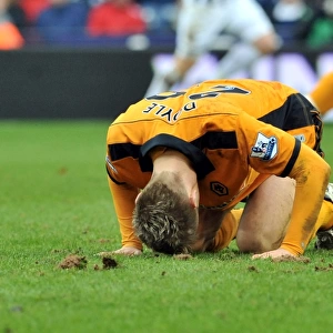 Wolverhampton Wanderers Kevin Doyle Doubled Over in Pain from Jonas Olsson's Crushing Knee to the Ribs (West Bromwich Albion vs. Wolves)