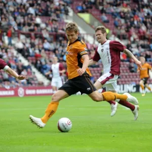 Wolverhampton Wanderers Kevin Doyle: Pursuing Victory - Pre-season Friendly vs Heart of Midlothian: Aiming for the Winning Goal Wolverhampton Wanderers Kevin Doyle: Pursuing Victory - Pre-season Friendly vs Heart of Midlothian: Aiming for the Winning Goal