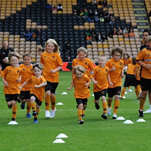 Wolverhampton Wanderers: Matchday Mascots Gear Up for Wolves vs. Real Zaragoza Showdown - Behind the Scenes Training