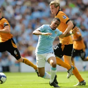Wolverhampton Wanderers Richard Stearman vs Manchester City's Robinho: A Yellow Card Battle in the 2009 BPL Clash