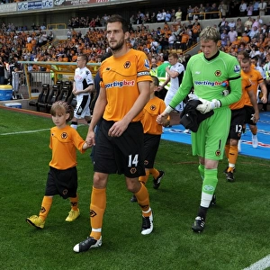 Wolverhampton Wanderers: Roger Johnson Leads the Team Out in Barclays Premier League Match against Fulham