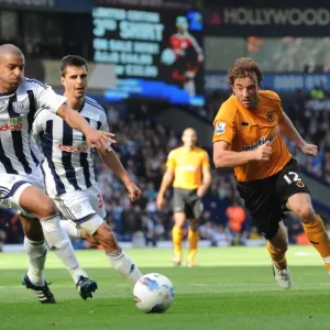 Wolverhampton Wanderers Stephen Hunt Slips Past Scharner and Reid in Intense Barclays Premier League Showdown Wolverhampton Wanderers Stephen Hunt Slips Past Scharner and Reid in Intense Barclays Premier League Showdown