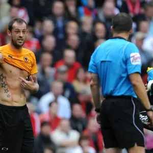 Wolverhampton Wanderers Steven Fletcher Shows Refree Kevin Friend Injury during Liverpool vs. Wolverhampton Premier League Match