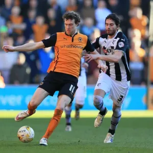 Wolverhampton Wanderers vs. Watford: A Championship Showdown - Intense Battle Between Kevin McDonald and Gianni Munari