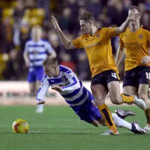 Wolverhampton Wanderers vs. Reading: Clash at Molineux - Edwards Fouls Vydra in Sky Bet Championship Match Wolverhampton Wanderers vs. Reading: Clash at Molineux - Edwards Fouls Vydra in Sky Bet Championship Match