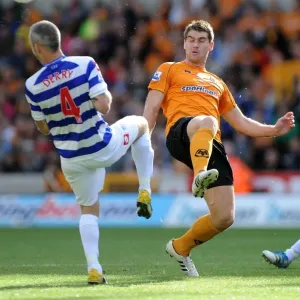 Wolverhampton Wanderers vs. Queens Park Rangers: A Battle Between Sam Vokes and Shaun Derry in the Barclays Premier League