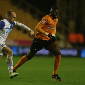 Wolverhampton Wanderers vs. Blackburn Rovers: Bakary Sako Evades Danny Murphy's Tackle in Championship Showdown at Molineux