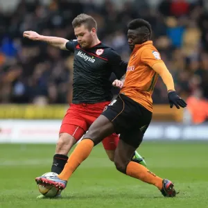 Wolverhampton Wanderers vs. Cardiff City: A Championship Showdown - Midfield Battle between Sako and Gunnarsson Wolverhampton Wanderers vs. Cardiff City: A Championship Showdown - Midfield Battle between Sako and Gunnarsson