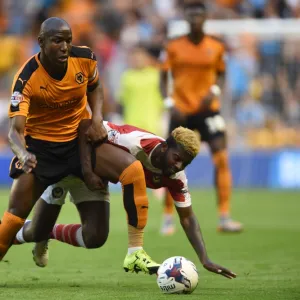 Wolverhampton Wanderers vs Newport County: Battle for the Ball in Capital One Cup First Round