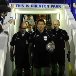 Wolverhampton Wanderers vs. Tranmere Rovers: FA Cup Round Three - The Teams and Officials Take the Field at Prenton Park
