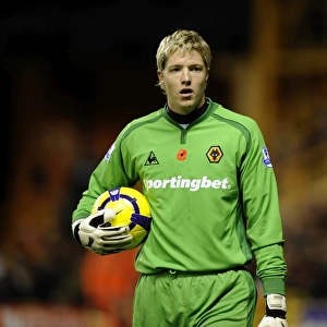 Wolverhampton Wanderers' Wayne Hennessey Pays Tribute with Poppy in Premier League Match Against Arsenal