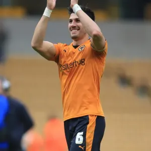 Wolves Celebrate Championship Victory: Batth's Goal Seals Win Against Huddersfield Town (Sky Bet Championship) Wolves Celebrate Championship Victory: Batth's Goal Seals Win Against Huddersfield Town (Sky Bet Championship)
