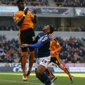 Wolves vs Birmingham City: Intense Battle for the Ball between Kortney Hause and David Davis