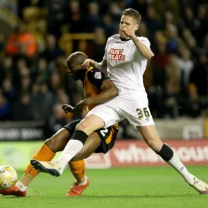 Wolves vs Derby County: Intense Battle for Supremacy - Afobe vs Albentosa at Molineux Stadium (Sky Bet Championship)