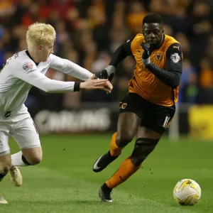 Wolves vs Derby County: Intense Battle Between Bakary Sako and Will Hughes in Sky Bet Championship Match