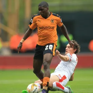 Wolves vs Huddersfield: Intense Battle for Possession - Sheyi Ojo vs Dean Whitehead (Sky Bet Championship) Wolves vs Huddersfield: Intense Battle for Possession - Sheyi Ojo vs Dean Whitehead (Sky Bet Championship)