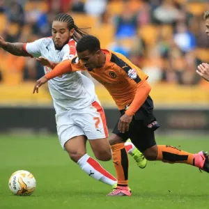 Wolves vs. Huddersfield: Intense Battle for Possession - Sky Bet Championship Wolves vs. Huddersfield: Intense Battle for Possession - Sky Bet Championship
