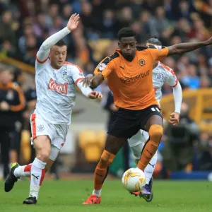 Wolves vs. Huddersfield Town: Intense Battle for Possession - Sky Bet Championship Wolves vs. Huddersfield Town: Intense Battle for Possession - Sky Bet Championship