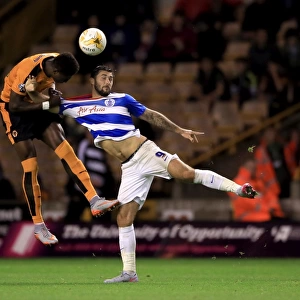 Wolves vs. Queens Park Rangers: Intense Battle for the Ball between Charlie Austin and Kortney Hause