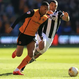 Wolves vs. Watford: Intense Battle Between Rajiv van La Parra and Troy Deeney in Sky Bet Championship Match at Molineux