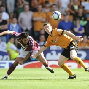 Wolves vs West Ham: Luis Jimenez vs Kevin Foley - Intense Clash at Molineux, Premier League 2009-09 Wolves vs West Ham: Luis Jimenez vs Kevin Foley - Intense Clash at Molineux, Premier League 2009-09