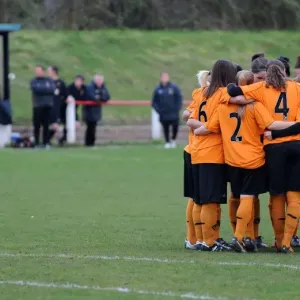 Wolves Women Unite: A Powerful Huddle Before Kick-Off Against Leafield Athletic