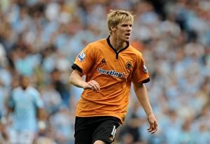 Manchester City vs Wolves Collection: Andy Keogh at City of Manchester Stadium: A Determined Striker's Battle (Premier League)