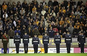 Wolves v Arsenal Collection: Armed Forces Day Tribute: Wolves vs. Arsenal - Premier League Soccer Match at Molineux Stadium