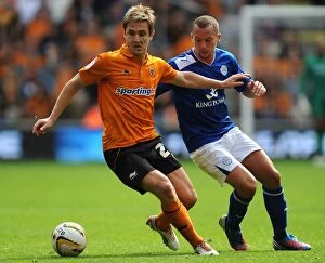 Images Dated 16th September 2012: Battle for the Ball: Drinkwater vs. Doyle - Wolverhampton Wanderers vs