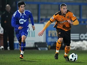 Images Dated 15th March 2011: Battle of the Michaels: Kightly vs O'Halloran - Wolverhampton Wanderers vs Bolton Wanderers in