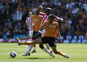 Images Dated 11th April 2010: Battle of the Midfield: Sidibe vs Mancienne in Wolverhampton Wanderers vs Stoke City (April 11)