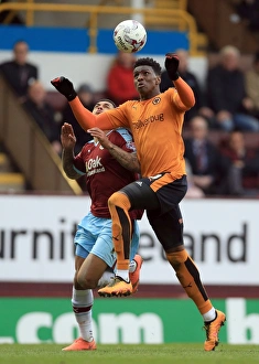 Sky Bet Championship Prints: Burnley vs. Wolves: Andre Gray and Kortney Hause Clash in Sky Bet Championship Match at Turf Moor
