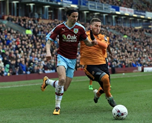 Burnley vs. Wolves: Intense Battle for the Ball between George Boyd and Matt Doherty at Turf Moor