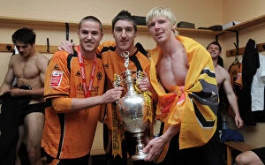 Championship Champions Celebration Collection: Champions League Upset: Wolverhampton Wanderers Emotional Dressing Room Triumph with Kightly