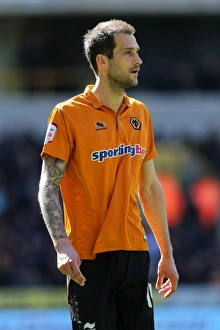 Season 2012-13 Prints: Championship Showdown at Molineux: Wolverhampton Wanderers vs Burnley - Roger Johnson's Action-Packed Performance