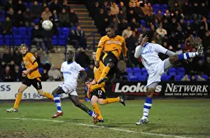 Charging Forward: Sylvan Ebanks-Blake's Determined Advance Towards the Goal in FA Cup Round Three (Tranmere Rovers vs. Wolverhampton Wanderers)