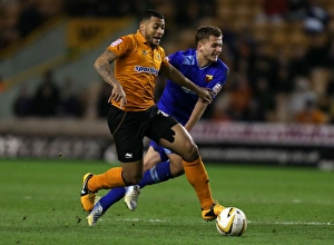 Season 2012-13 Prints: Clash between Davis and Abdi: Wolverhampton Wanderers vs