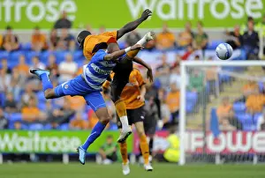 Clash of Forces: Jimmy Kebe vs. George Elokobi in the Reading vs. Wolverhampton Wanderers Pre-Season Friendly
