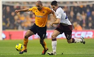 Wolves v Aston Villa Collection: Clash between Henry and Clark: Wolverhampton Wanderers vs Aston Villa in the Premier League