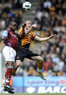 Images Dated 26th September 2010: Clash of the Midfield Titans: David Jones vs Nigel Reo-Coker - Wolverhampton Wanderers vs Aston