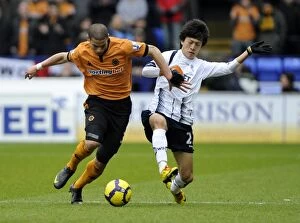 Bolton v Wolves Collection: Clash of the Midfield Titans: Guedioura vs. Lee - Bolton vs. Wolverhampton Wanderers Premier