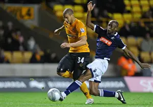Framed Print : Clash of the Midfielders: Guedioura vs Abdou in Wolverhampton Wanderers vs Millwall Carling Cup Showdown Framed Print : Clash of the Midfielders: Guedioura vs Abdou in Wolverhampton Wanderers vs Millwall Carling Cup Showdown