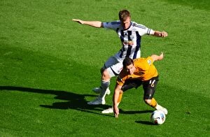 Images Dated 16th October 2011: Clash of the Midlands: Brunt vs. Jarvis - Premier League Rivalry: West Bromwich Albion vs