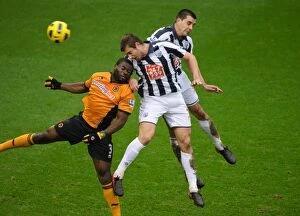 West Bromwich Albion v Wolves Collection: Clash of the Midlands: Elokobi, Tamas, and Scharner in Action - West Bromwich Albion vs