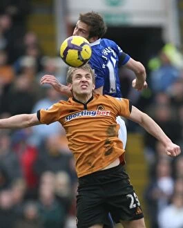 Images Dated 7th February 2010: Clash in the Midlands: Premier League Showdown - Kevin Doyle vs. Roger Johnson