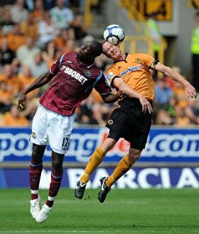 Images Dated 15th August 2009: Clash at Molineux: A Battle Between Carlton Cole and Jody Craddock