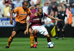 Wolves V West Ham United Prints: Clash at Molineux: Wolves vs. West Ham United - Henry vs. Dyer: A Premier League Battle