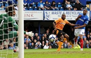 Portsmouth v Wolves Collection: Clash of the Strikers: Ebanks-Blake vs Piquionne in the Barclays Premier League