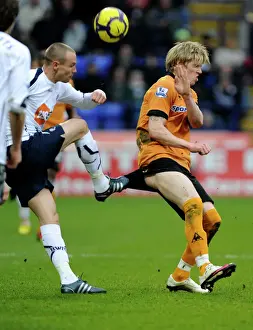 Wolves Prints: Clash of Titans: Andrew Keogh vs Matt Taylor - Premier League Battle: Wolverhampton Wanderers vs Bolton Wanderers